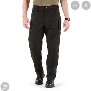 5.11 TACTICAL SERIES cargo, utility,pants. Black. Many pockets. Size W. 40 L. 34